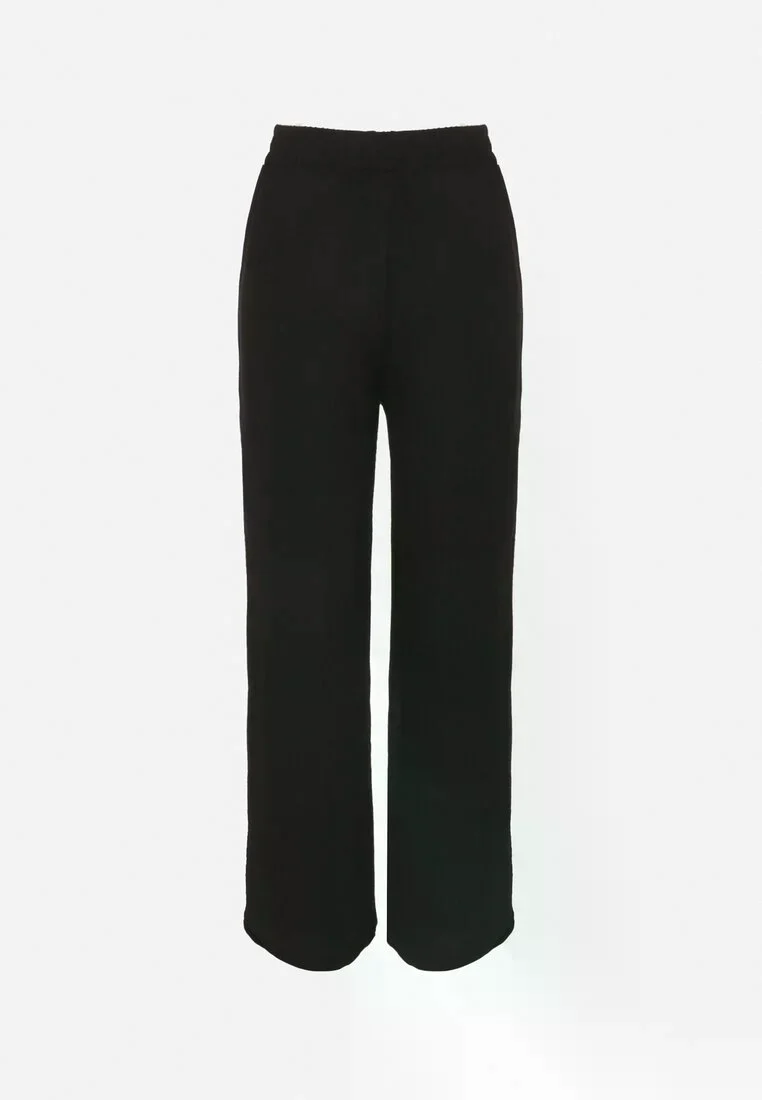 Pantalon droit fluide à nouer à la taille - Image 11